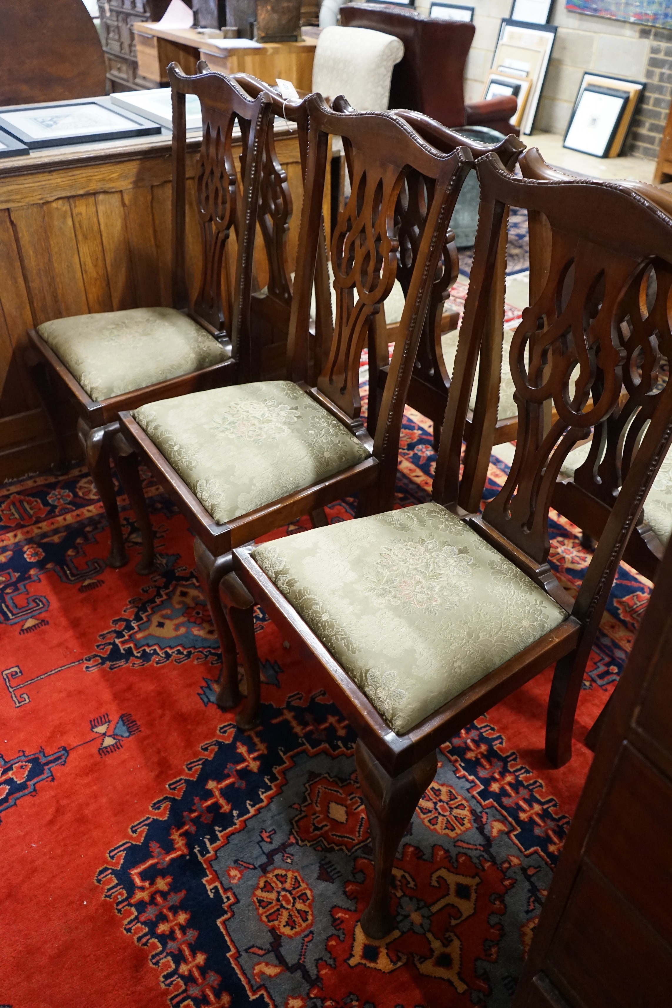 A set of six Chippendale style mahogany dining chairs